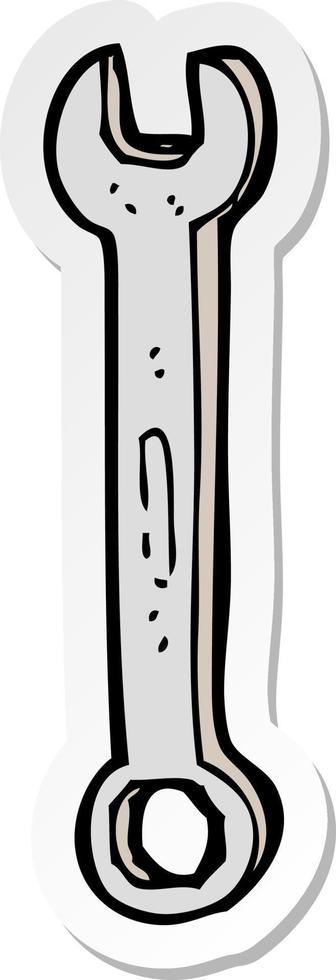 sticker of a cartoon spanner vector
