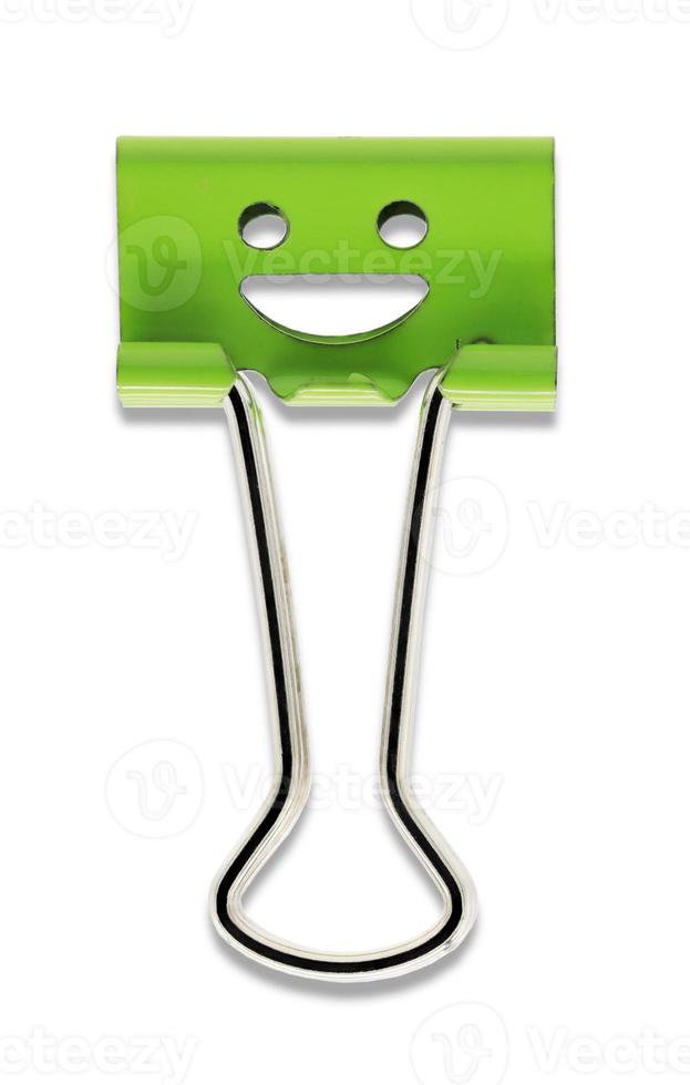 Smile green binder clip isolated on white background photo