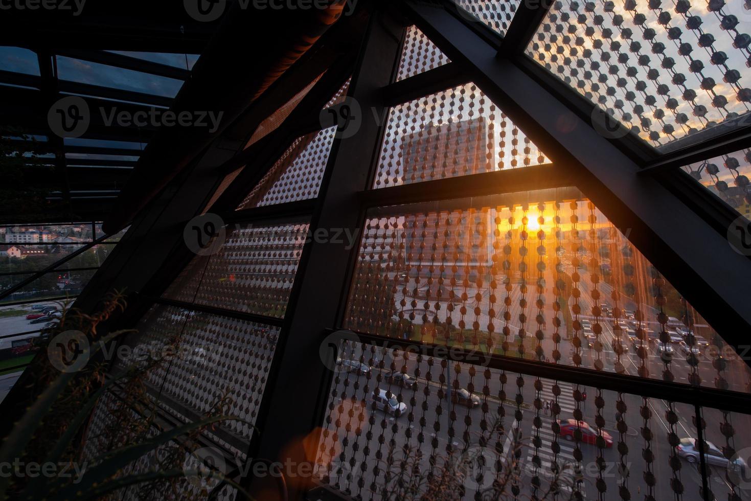 sunset through a glass roof photo