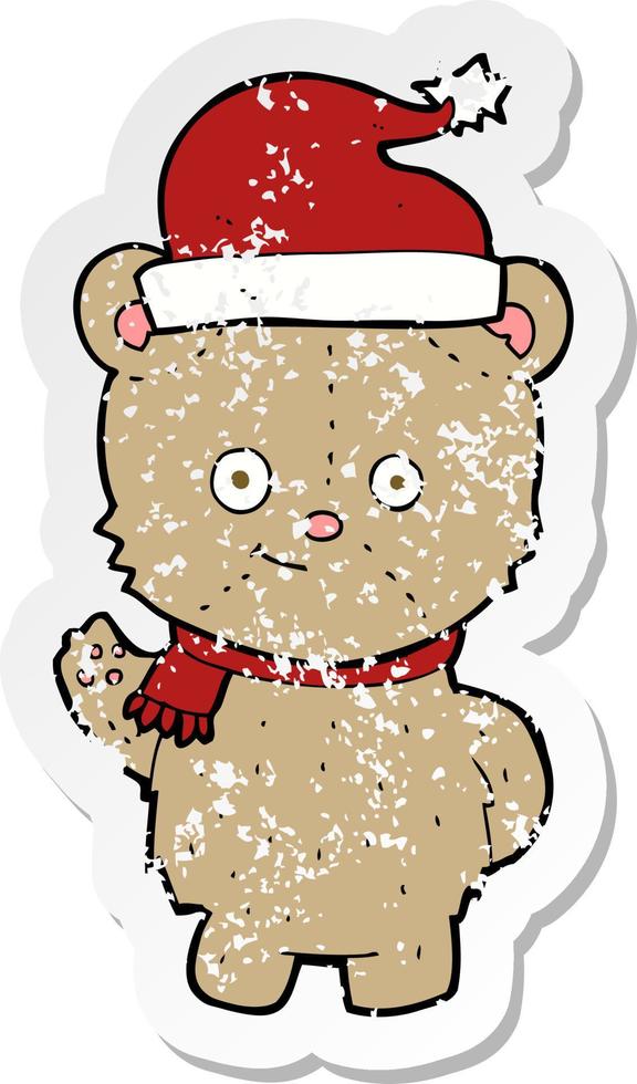 retro distressed sticker of a cartoon christmas teddy bear vector