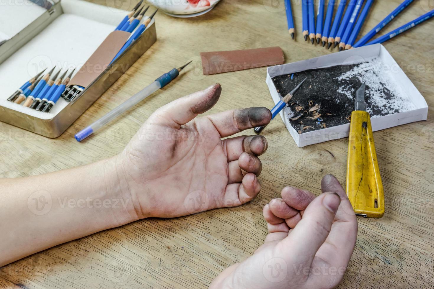 Dirty hand of woman on desk photo