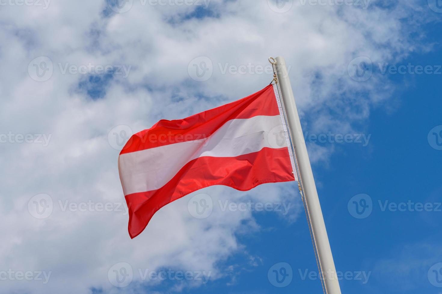 Austrian flag waving in the wind photo
