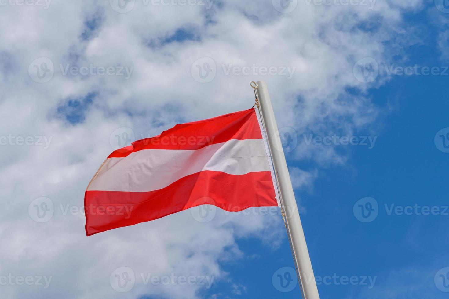 Austrian flag waving in the wind photo