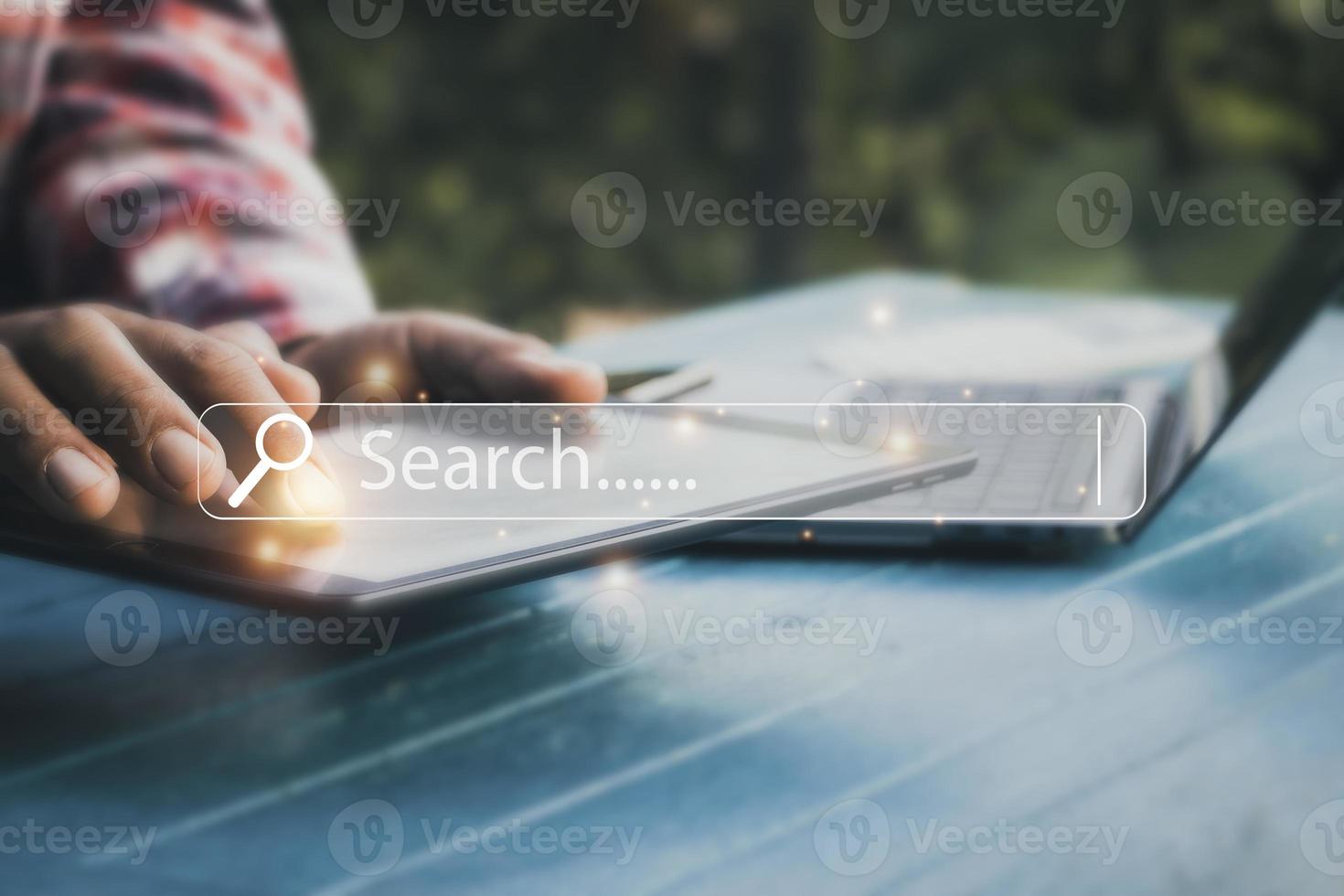 Hand man using tablet and Searching browsing data on the Internet online.network,media, keyword,Digital Web,Photo concept Searchbody part. photo