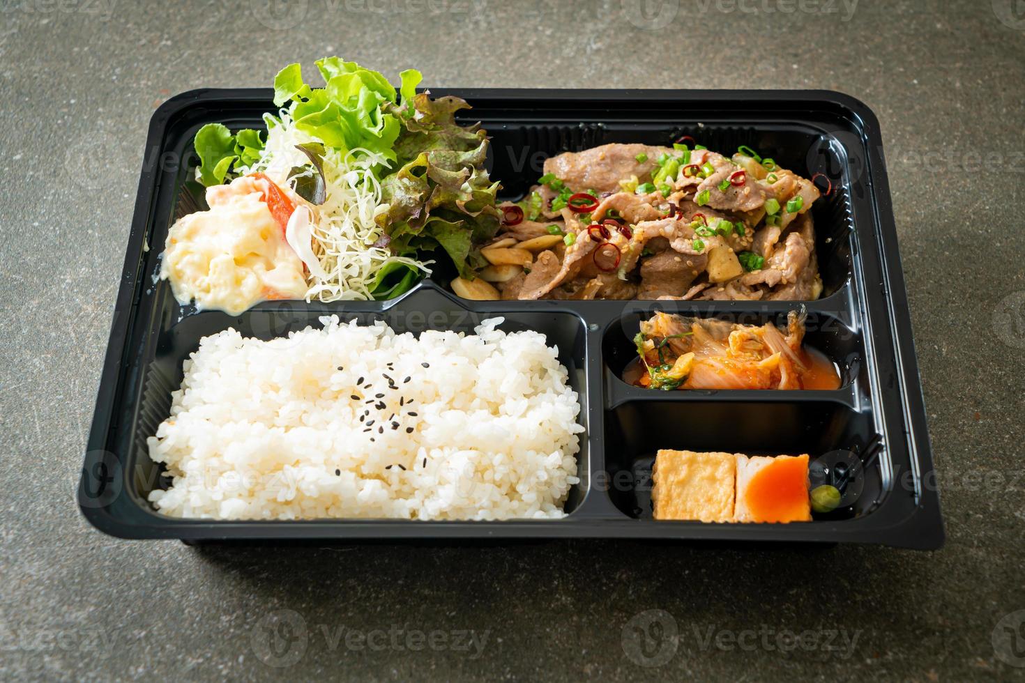 Japanese rice with pork yaki bento set photo