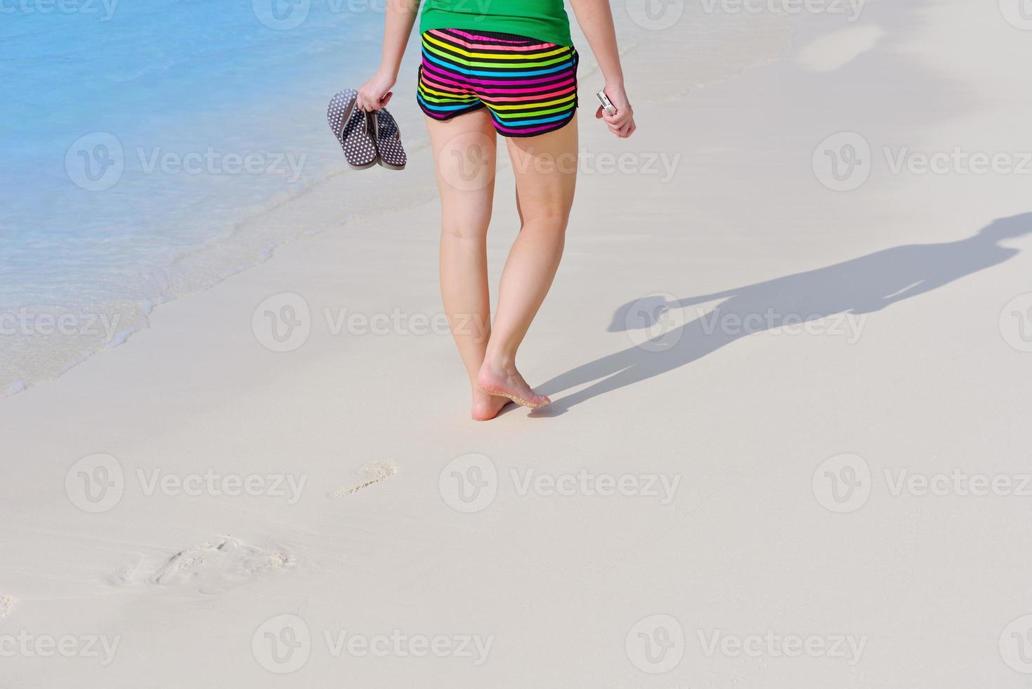 beautiful gril on beach have fun photo