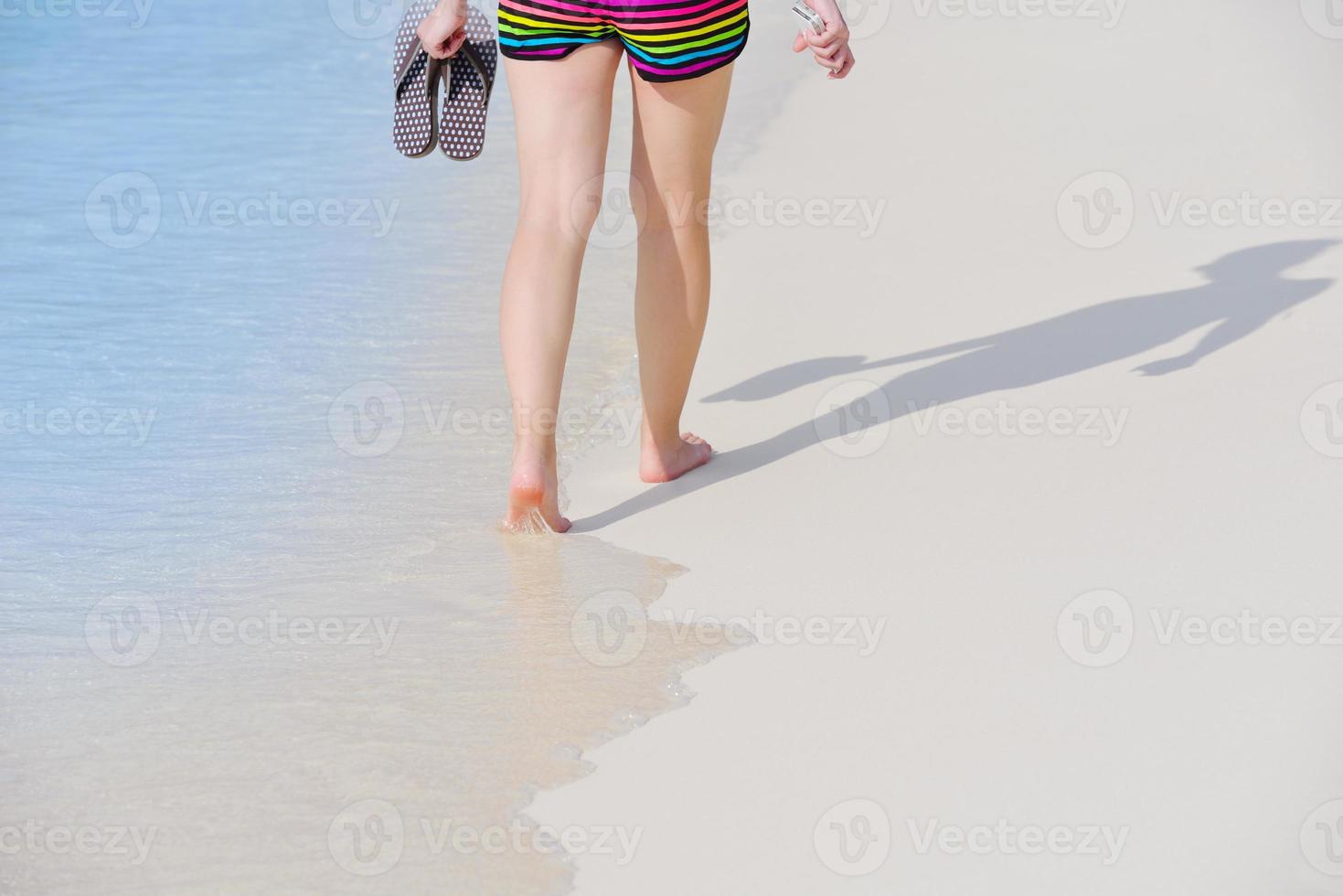 beautiful gril on beach have fun photo