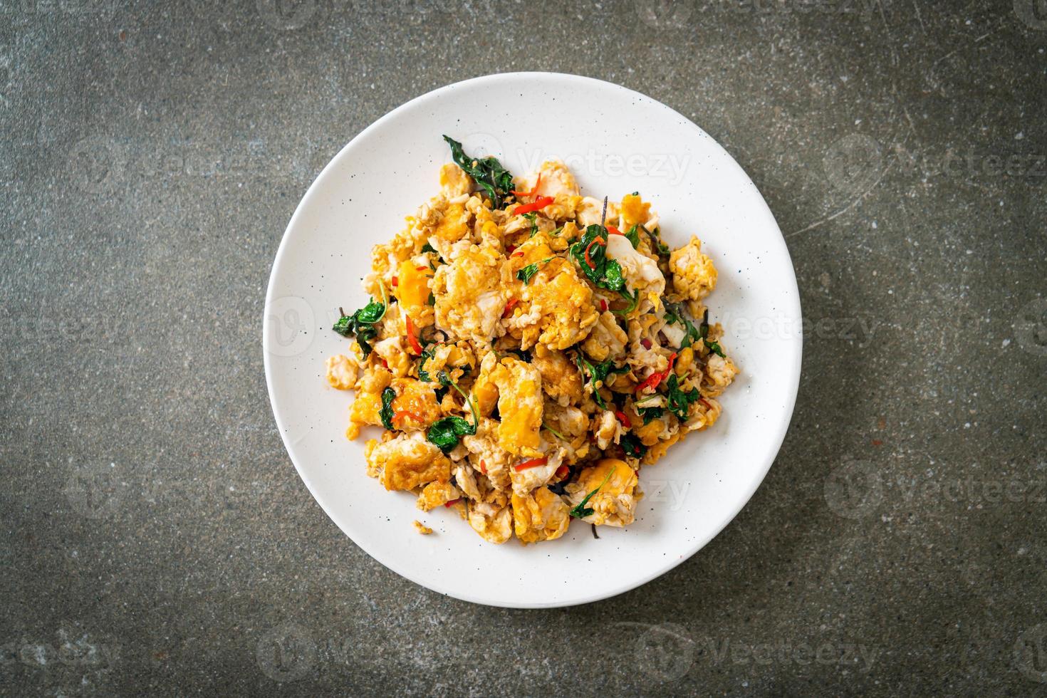 stir-fried egg with Thai basil and chilli photo