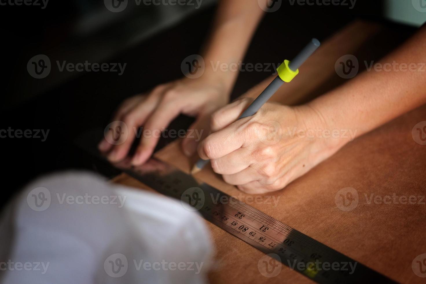 Close-up of a hardworking professional  . Concept workshop . craft photo