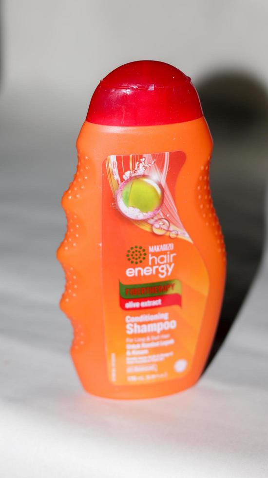 Medan, Indonesia - May 08, 2022 - Makarizo Hair shampoo is a product that is useful for treating and protecting hair from sun exposure in white background. photo