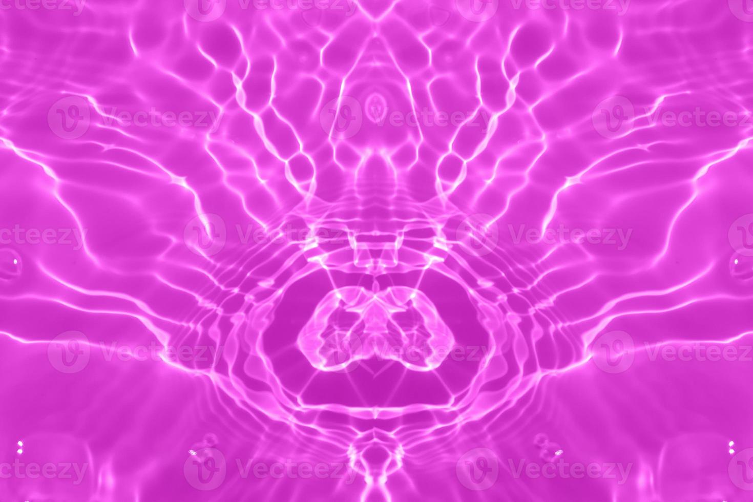 Defocus blurred transparent purple velvet colored clear calm water surface texture with splashes and bubble. Trendy abstract nature background. Water wave in sunlight with copy space. Water texture. photo