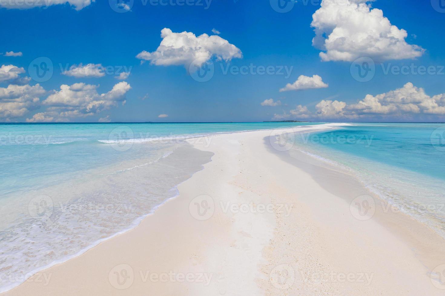 Closeup of sand on beach and blue summer sky. Panoramic beach landscape. Empty tropical beach and seascape. Bright sunny sky, soft sand, calmness, tranquil relaxing sunlight, summer mood photo