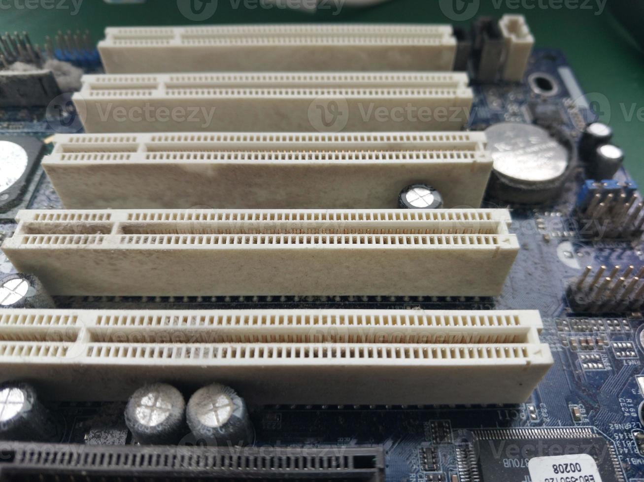 Retro computer motherboard with microcircuits photo