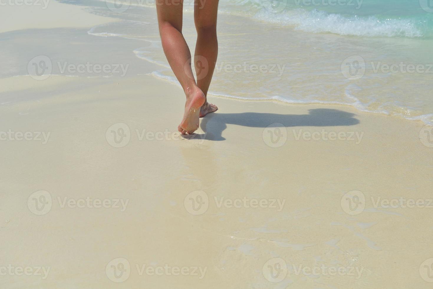 footsteps on beach photo
