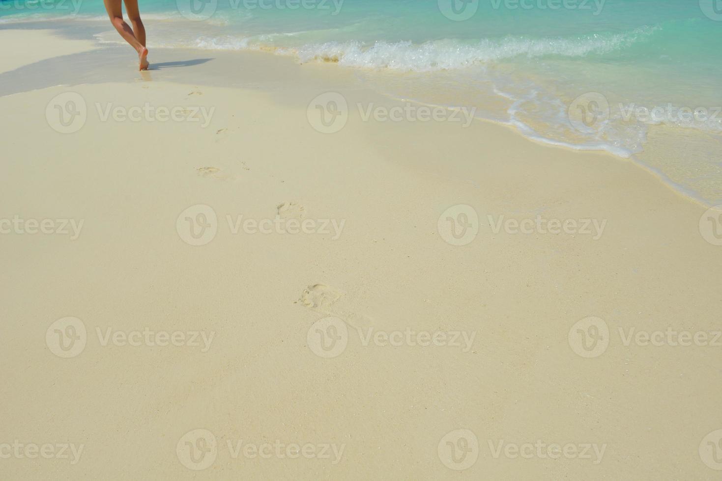 footsteps on beach photo