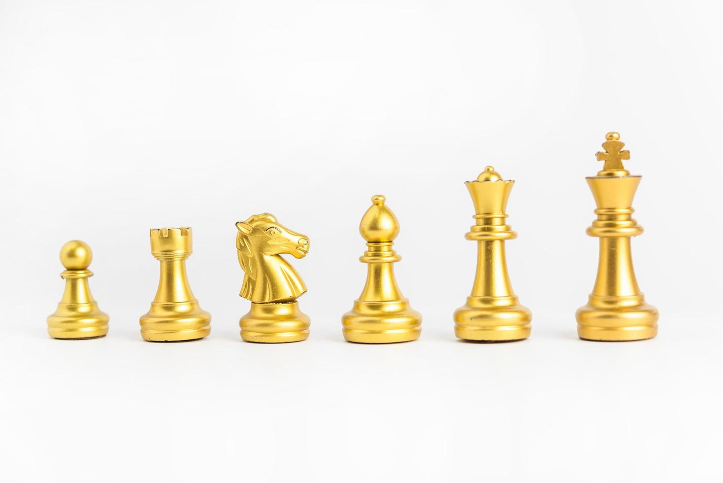 chess game gold isolated on white background. photo