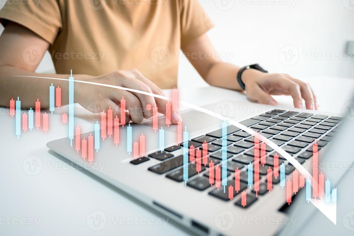 Investor analyze stock chart with laptop, businessman forecast and analysis graph in Bearish downtrend, economic slowdown, inflation crisis, loan interest rise, trade war finance, covid-19 impact. photo