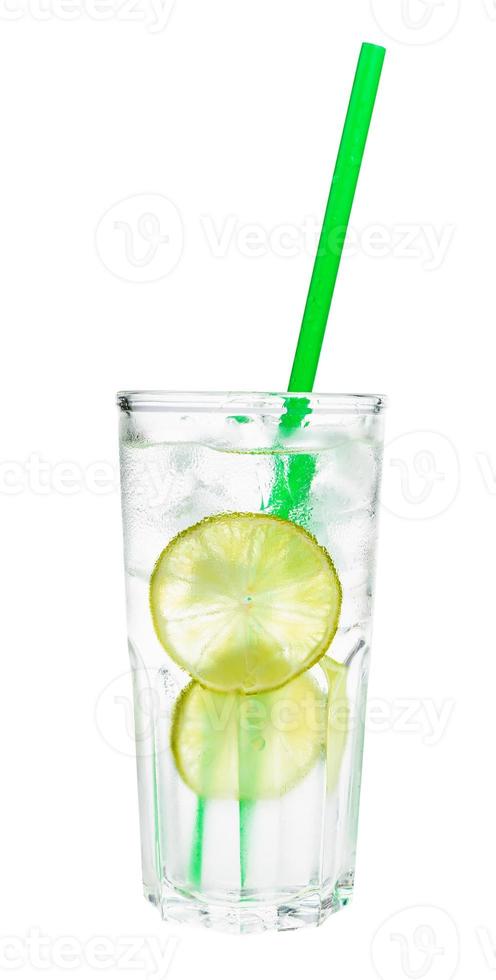 side view of gin tonic cocktail in highball glass photo