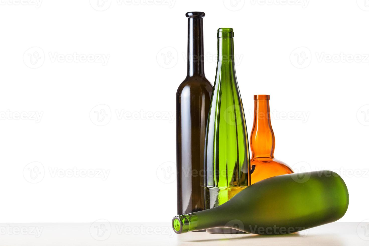 empty bottles on board with cutout background photo