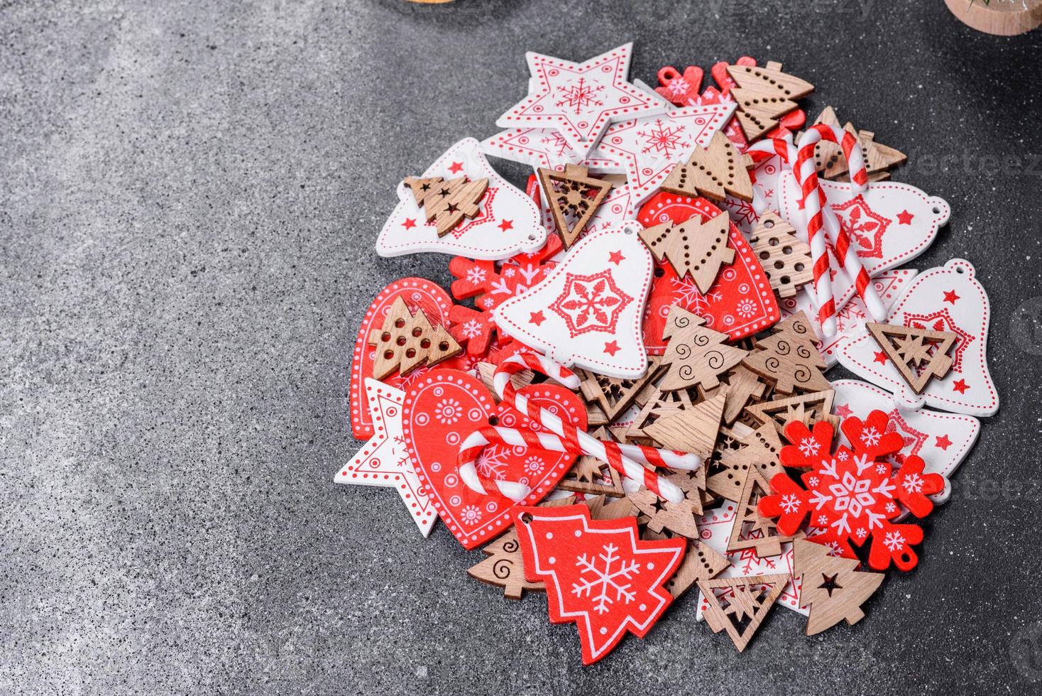 Gingerbread, Christmas tree decorations, dried citrus fruits on a gray concrete background photo