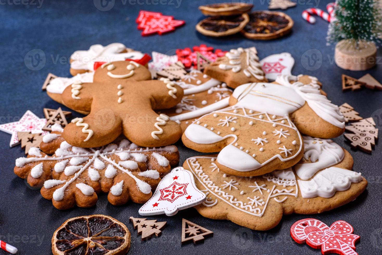 Christmas homemade gingerbread cookies on dark concrete table photo
