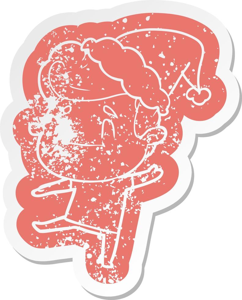 happy cartoon distressed sticker of a man wearing santa hat vector