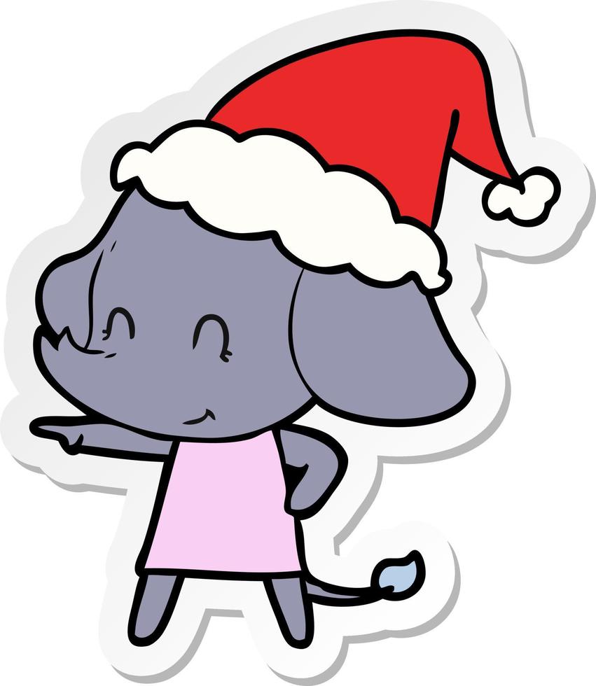 linda pegatina de dibujos animados de un elefante con gorro de Papá Noel vector