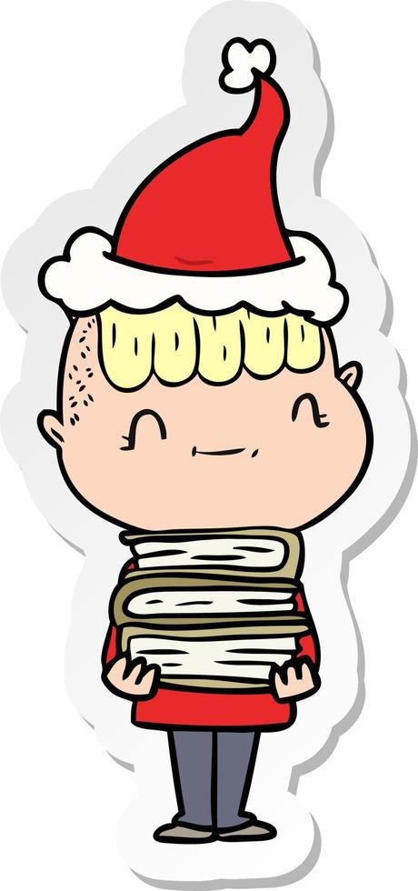 sticker cartoon of a friendly boy with books wearing santa hat vector