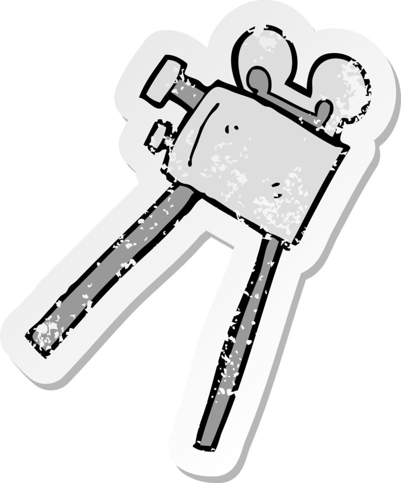 retro distressed sticker of a cartoon movie camera vector