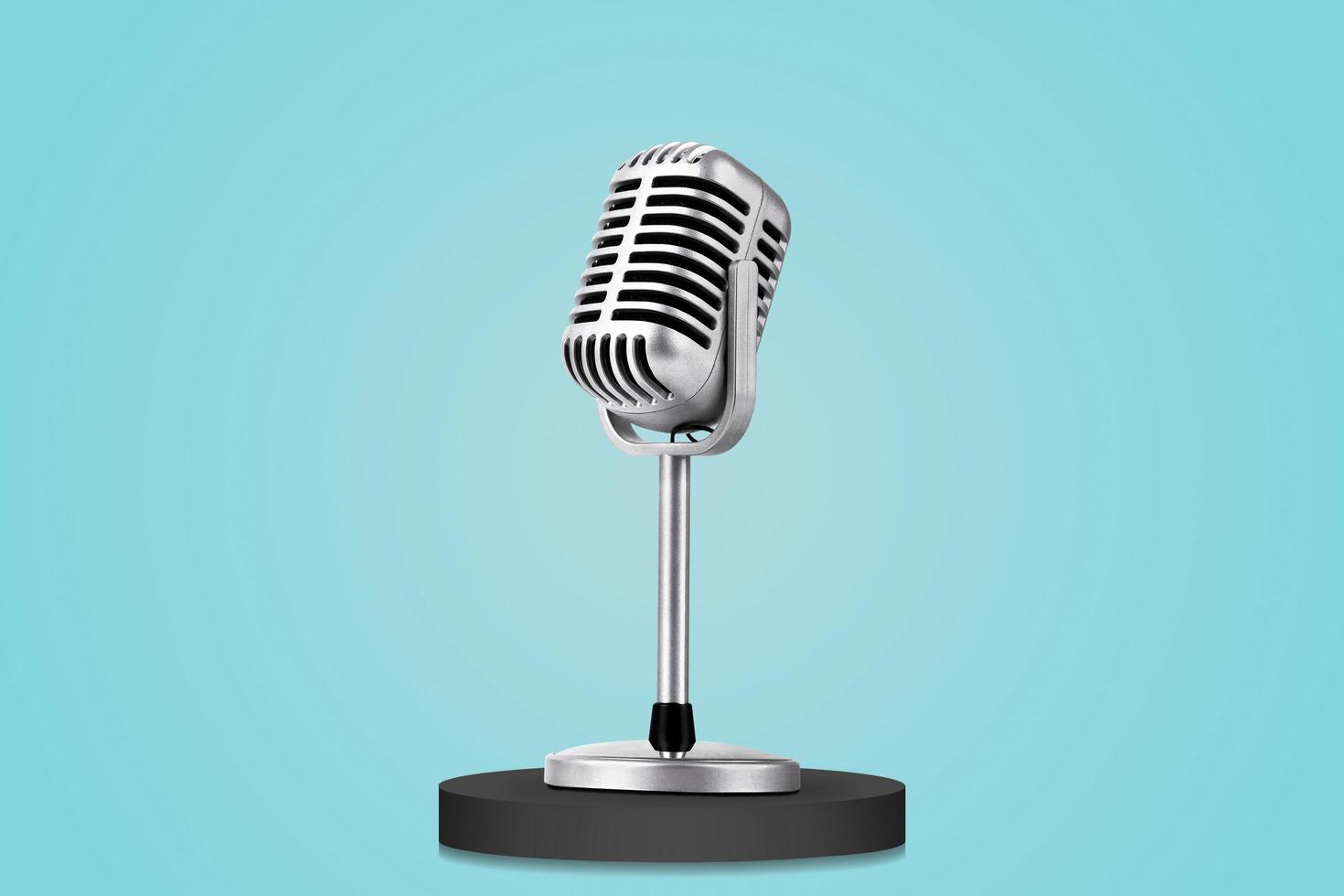 Retro style microphone isolated on blue background photo