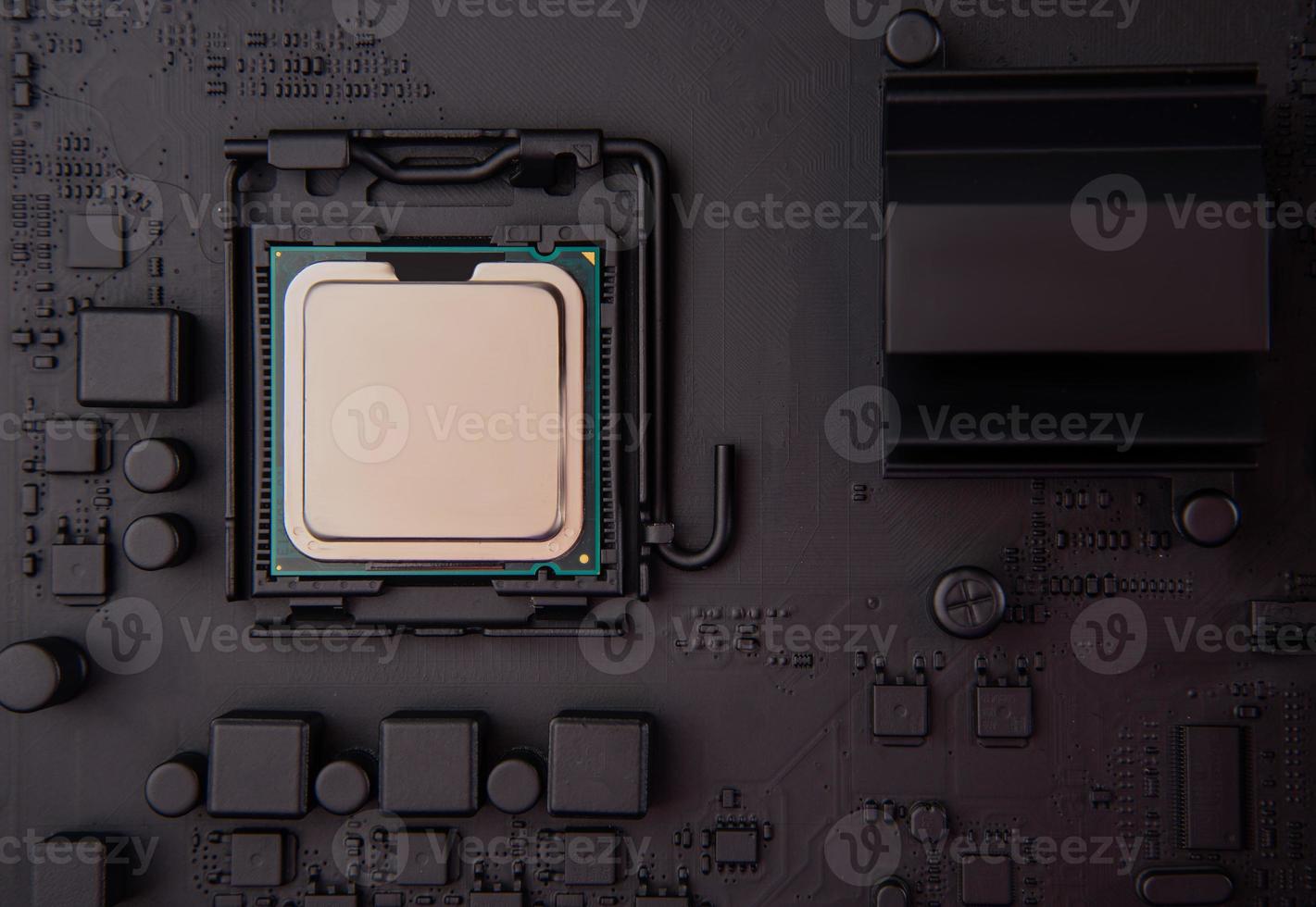 CPU unit on black motherbaord photo