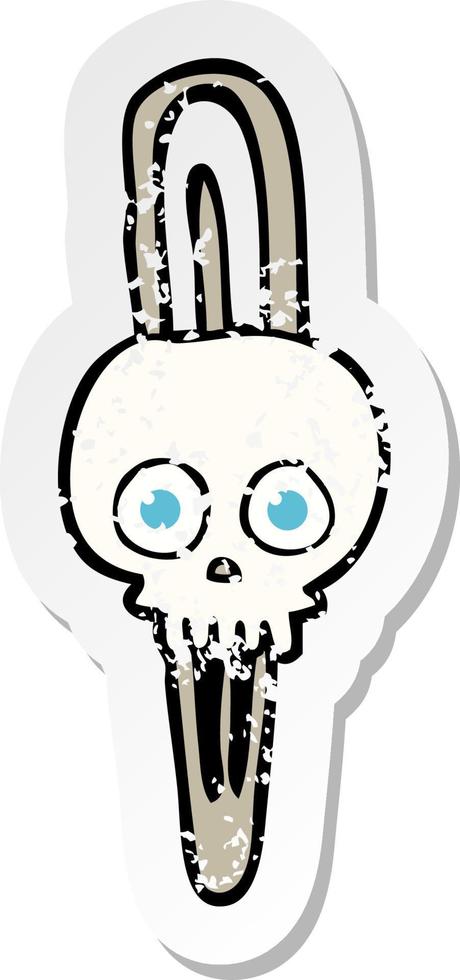 retro distressed sticker of a cartoon skull hairclip vector