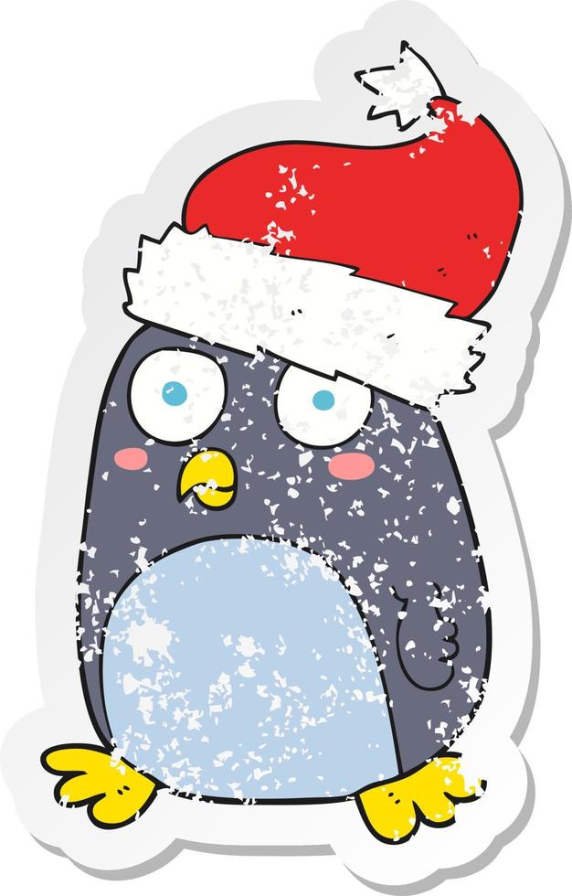 retro distressed sticker of a cartoon penguin in christmas hat vector