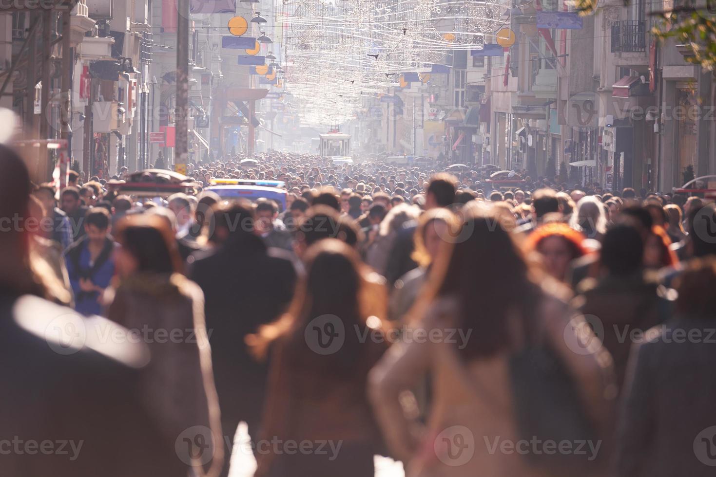 people crowd walking on street photo