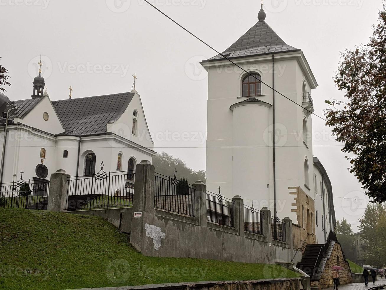 Streets of an old European city, cafes, restaurants, monuments, cathedrals and parks. City of Lviv, Ukraine. photo