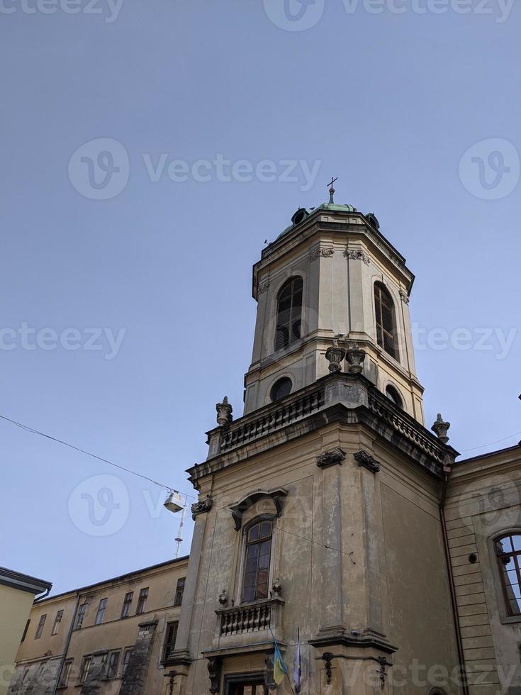 Streets of an old European city, cafes, restaurants, monuments, cathedrals and parks. City of Lviv, Ukraine. photo