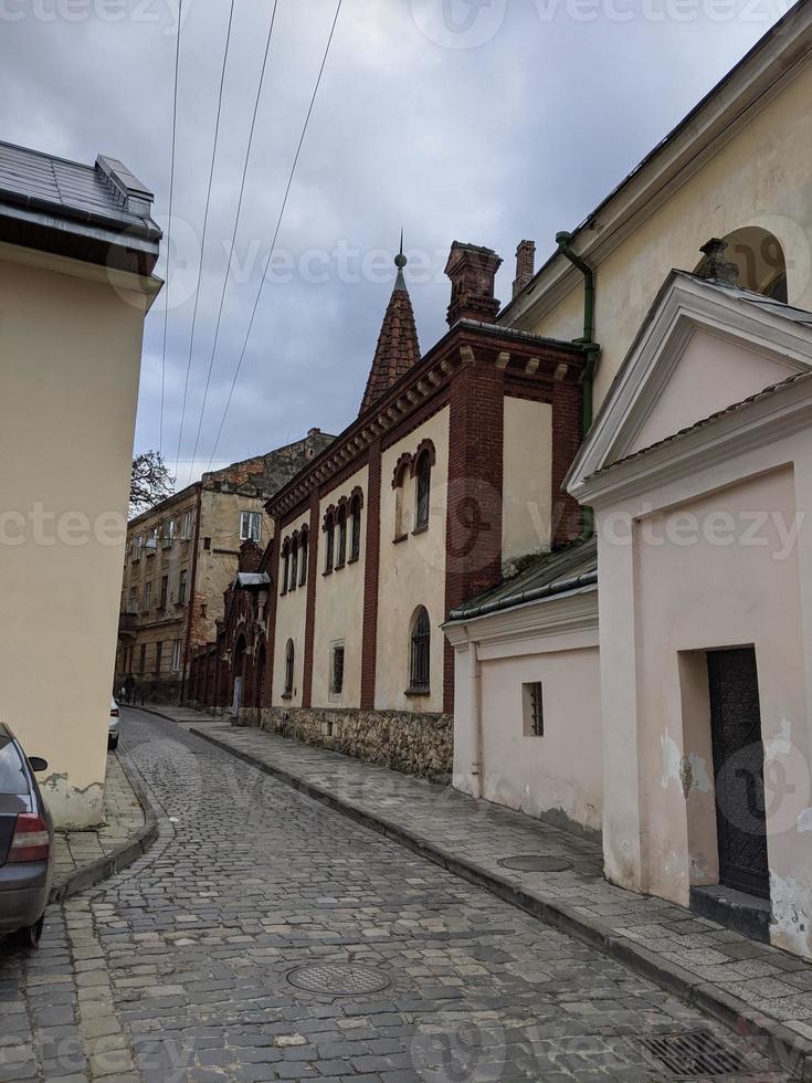 Streets of an old European city, cafes, restaurants, monuments, cathedrals and parks. City of Lviv, Ukraine. photo