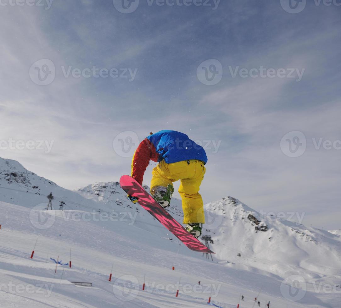 snowboarder extreme jump photo