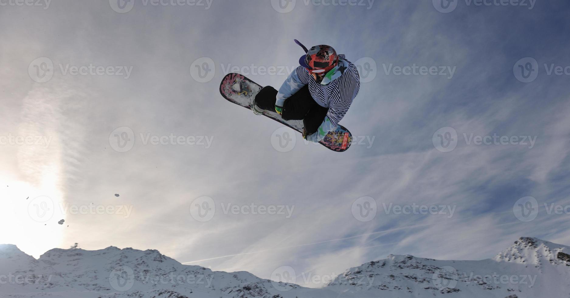 snowboarder extreme jump photo