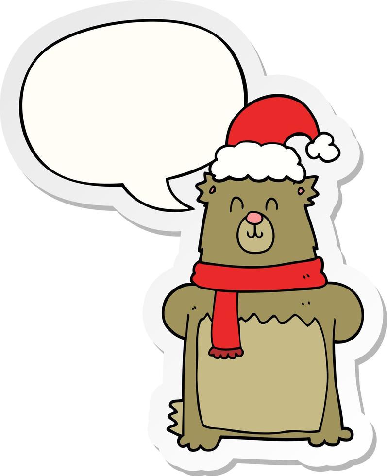 cartoon bear wearing christmas hat and speech bubble sticker vector