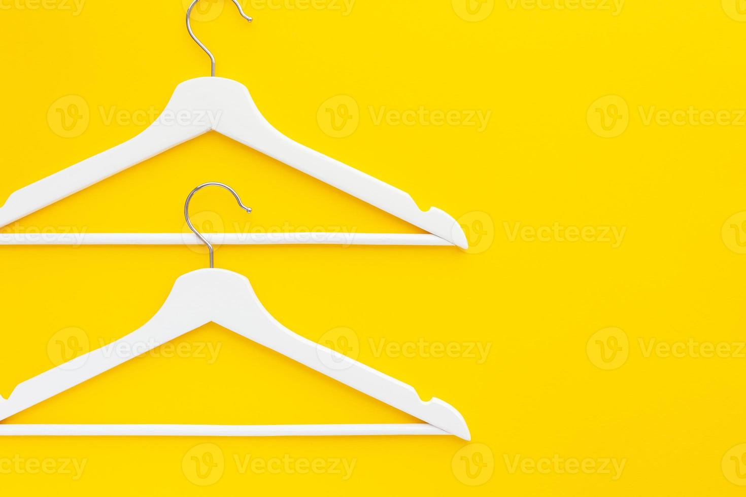 White hangers background for sale shopping concept photo