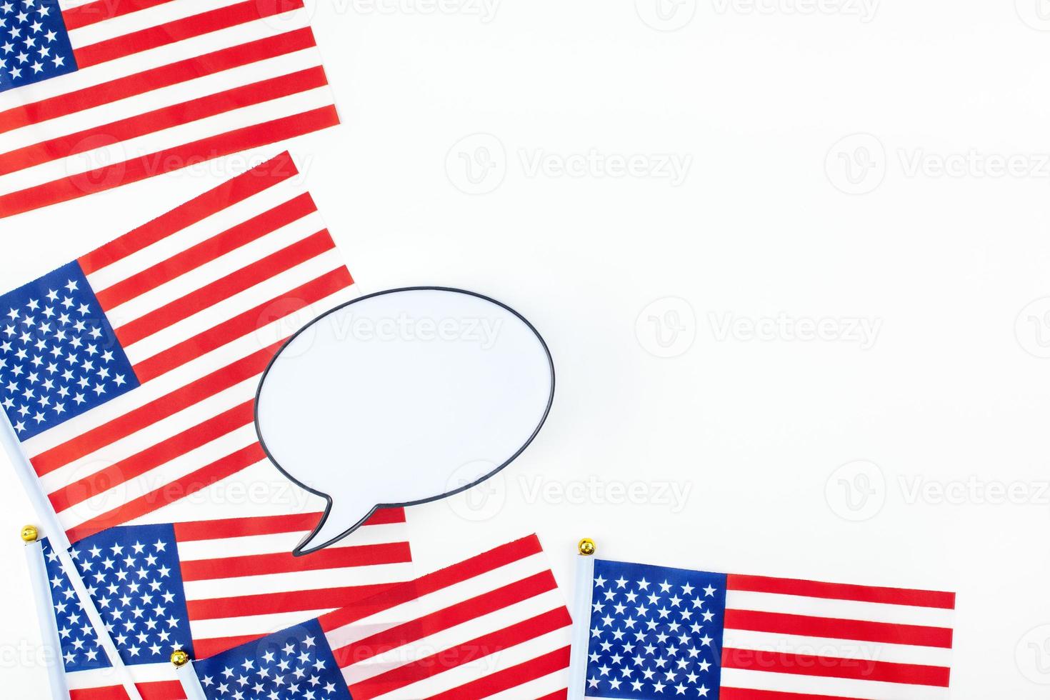 American flags on white background top view photo