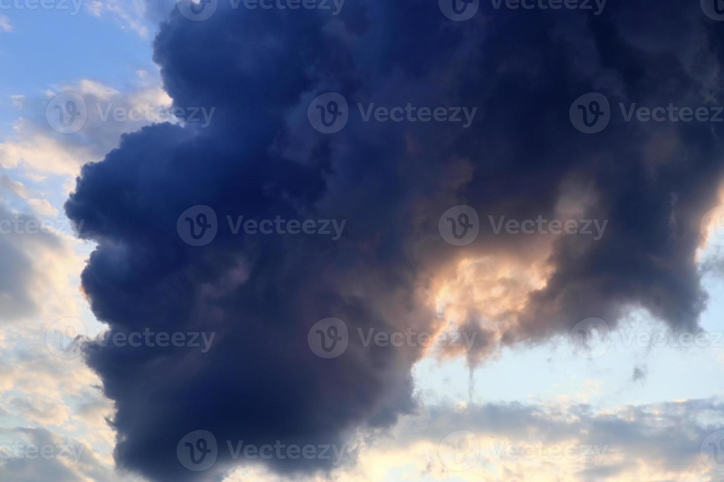 Stunning dark cloud formations right before a thunderstorm photo