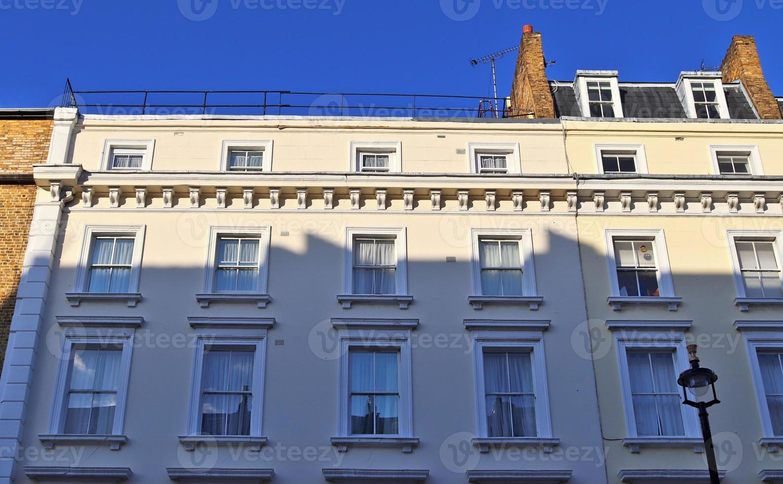 British architecture and facades of residential buildings the streets of London UK photo