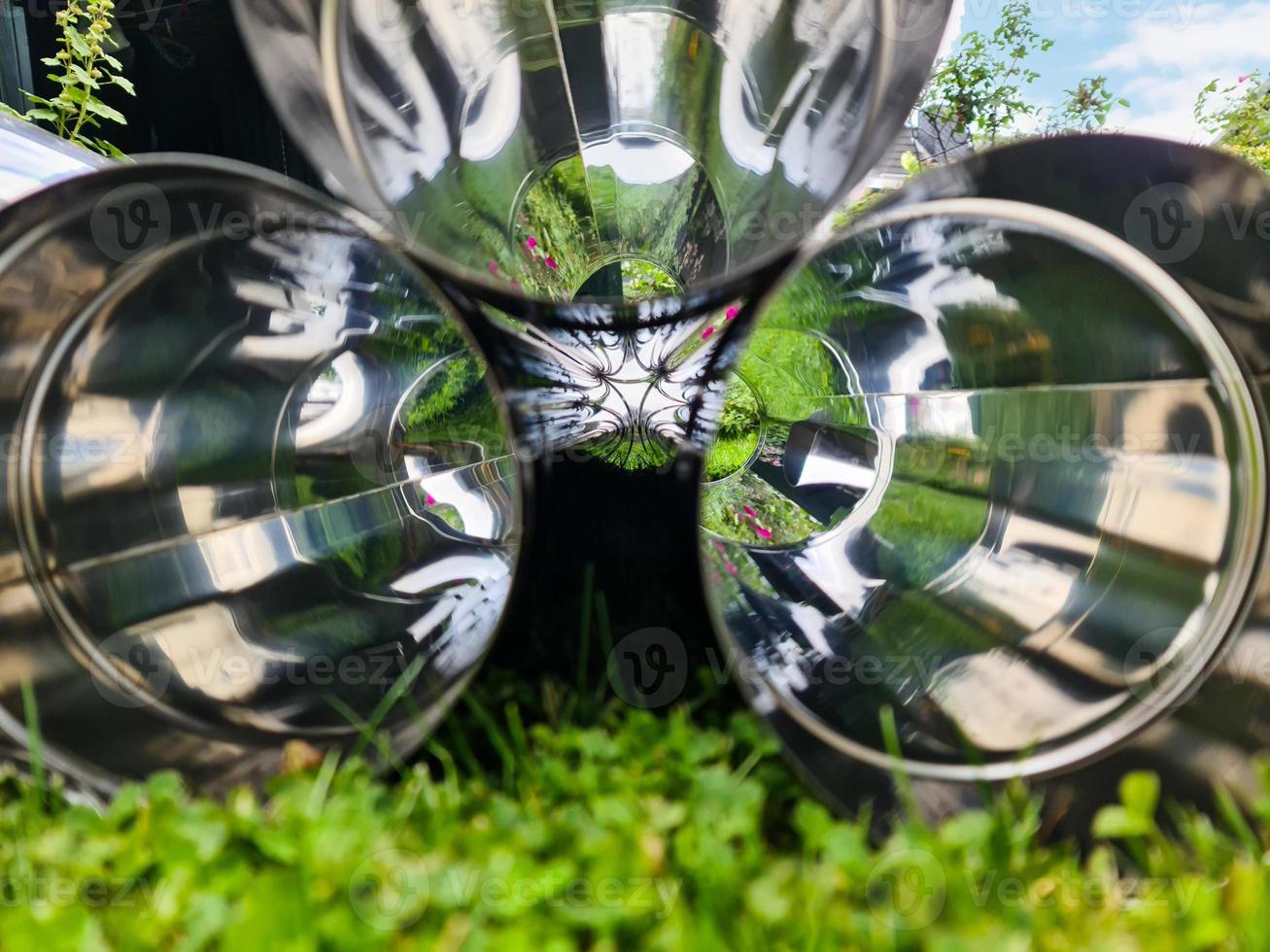 Close up view at a lot of reflective chrome metal tubes photo