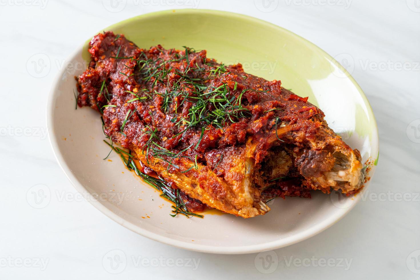 Deep fried fish and chili sauce photo