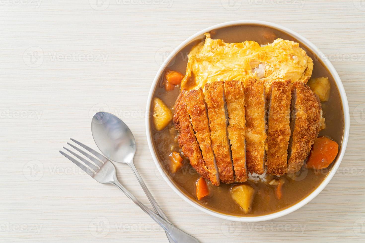 curry rice with fried pork cutlet and creamy omelet photo