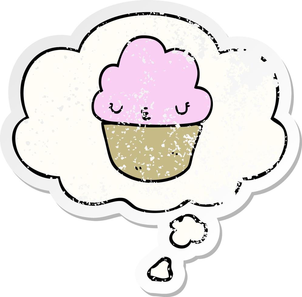 cartoon cupcake with face and thought bubble as a distressed worn sticker vector