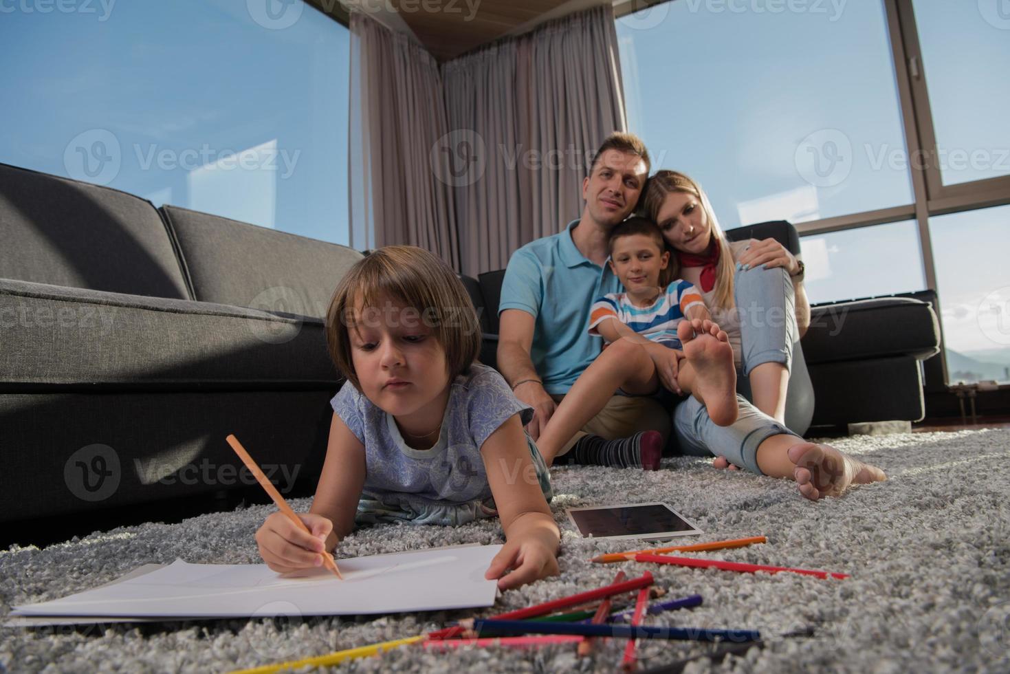 young couple spending time with kids photo