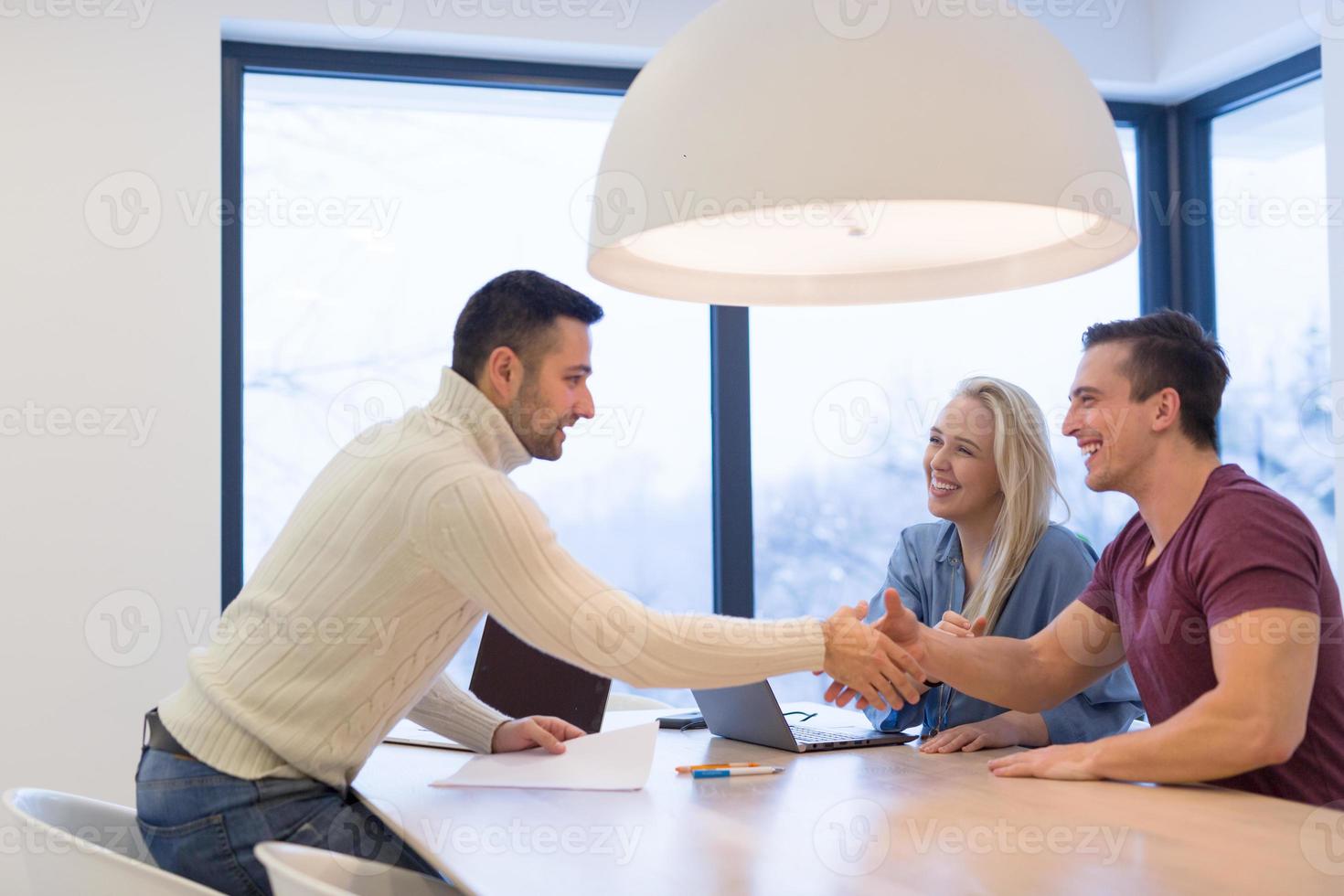 Startup Business Team At A Meeting at modern office building photo